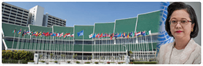 Executive Secretary in front of the ESCAP building